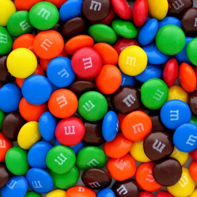 A pile of plain M&M's