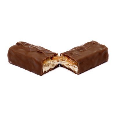 A Snickers bar broken in half, showing the peanuts, caramel and nougat